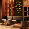 a room with booth seating and chairs
